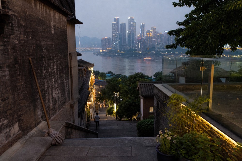 Night view across the Yangtze River toward the illuminated Chongqing skyline